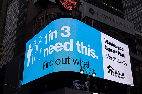 Billboard with housing quiz in Times Square, New York City